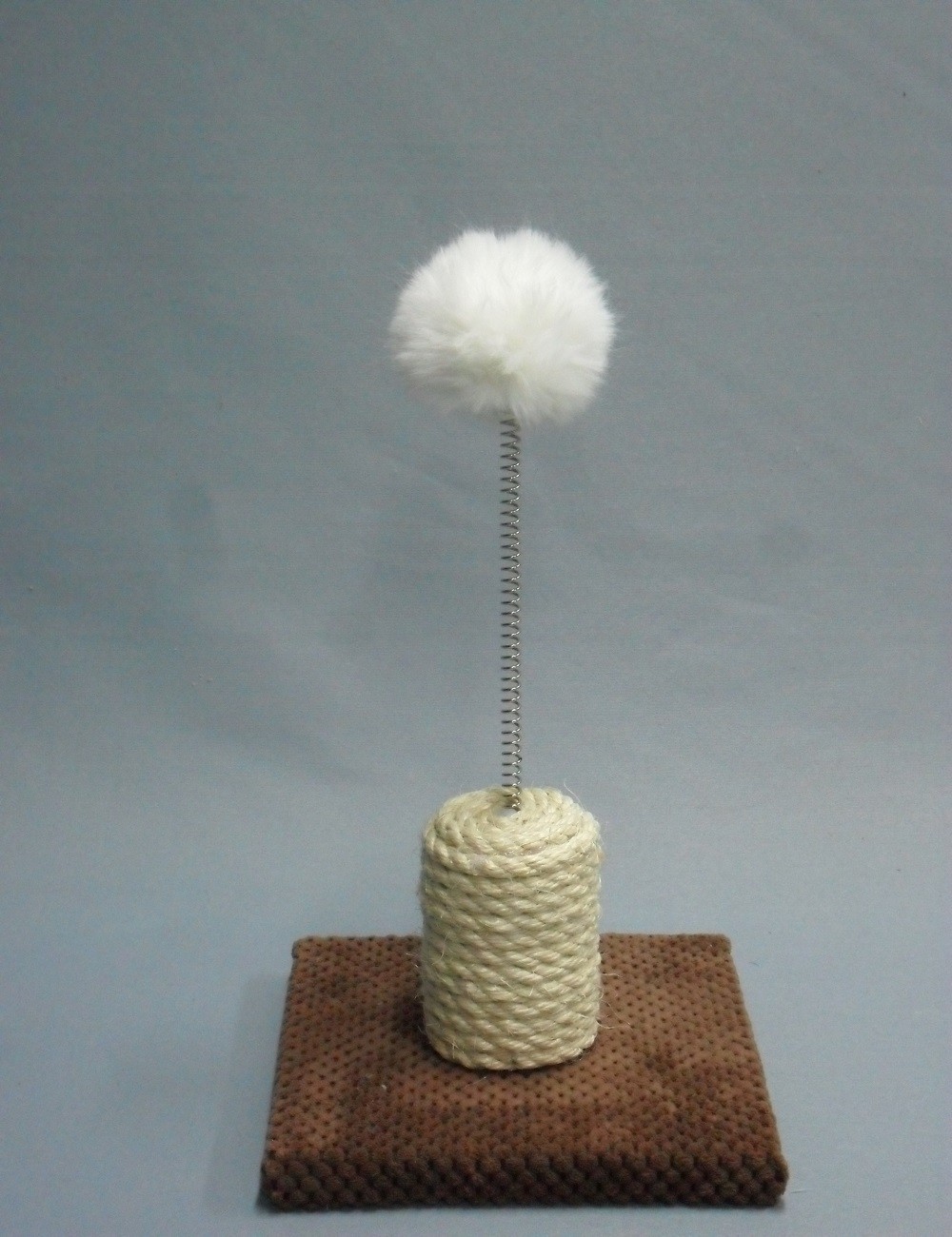 Drapak mini ze sprężyną